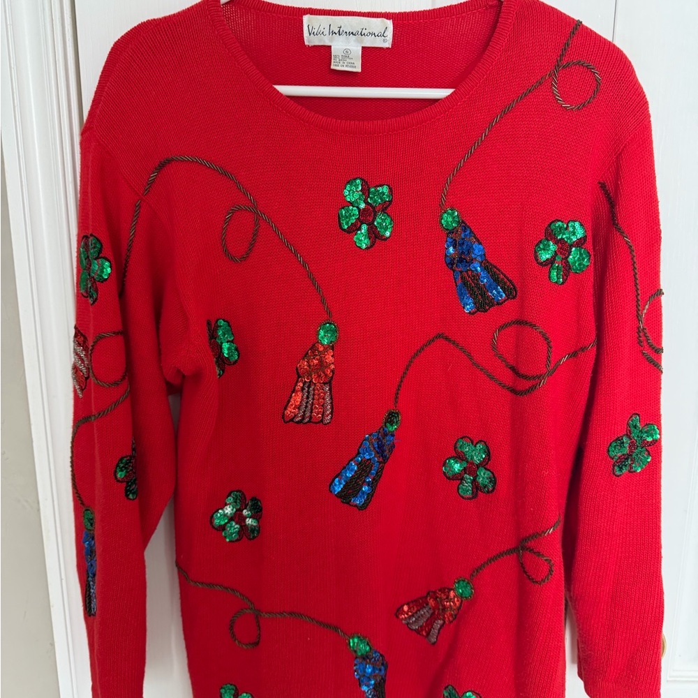 Red Sweater with Festive Embellishments
